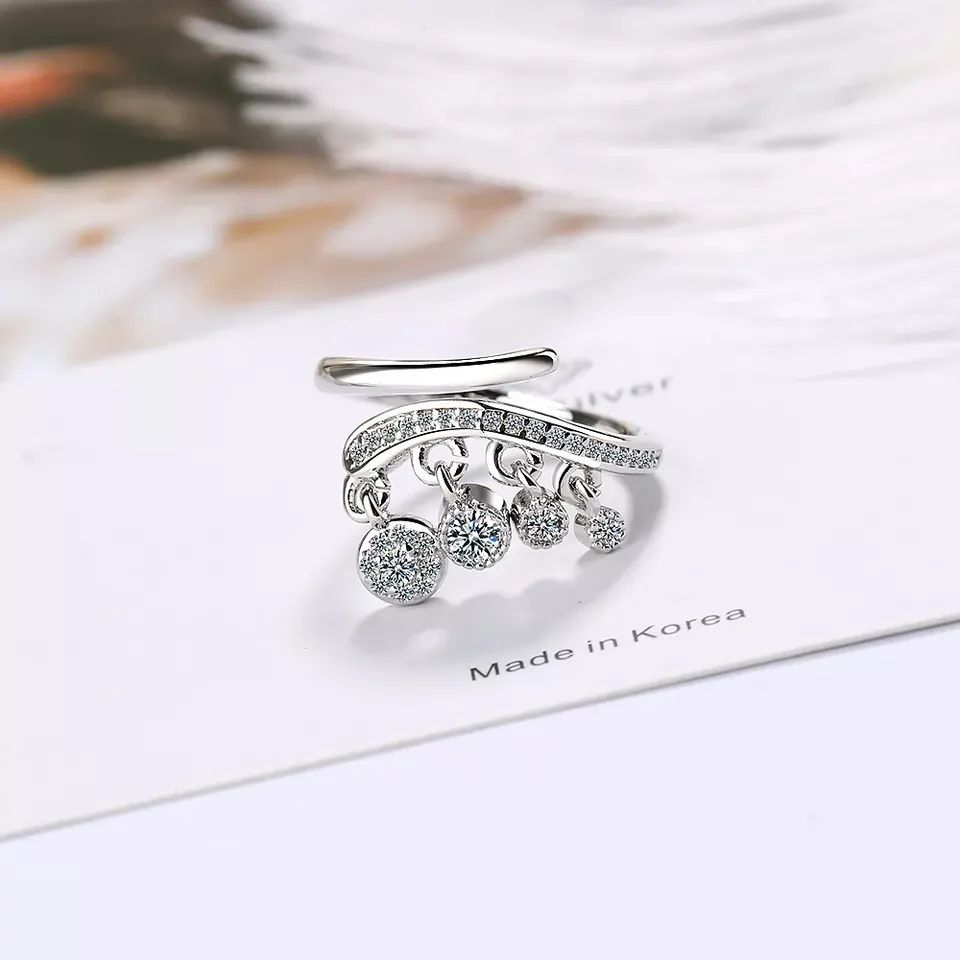 Anillo con zirconias colgantes 💎