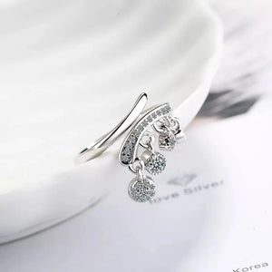 Anillo con zirconias colgantes 💎