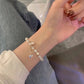 Pulsera de ojo de gato con corazón de cristal 🥰