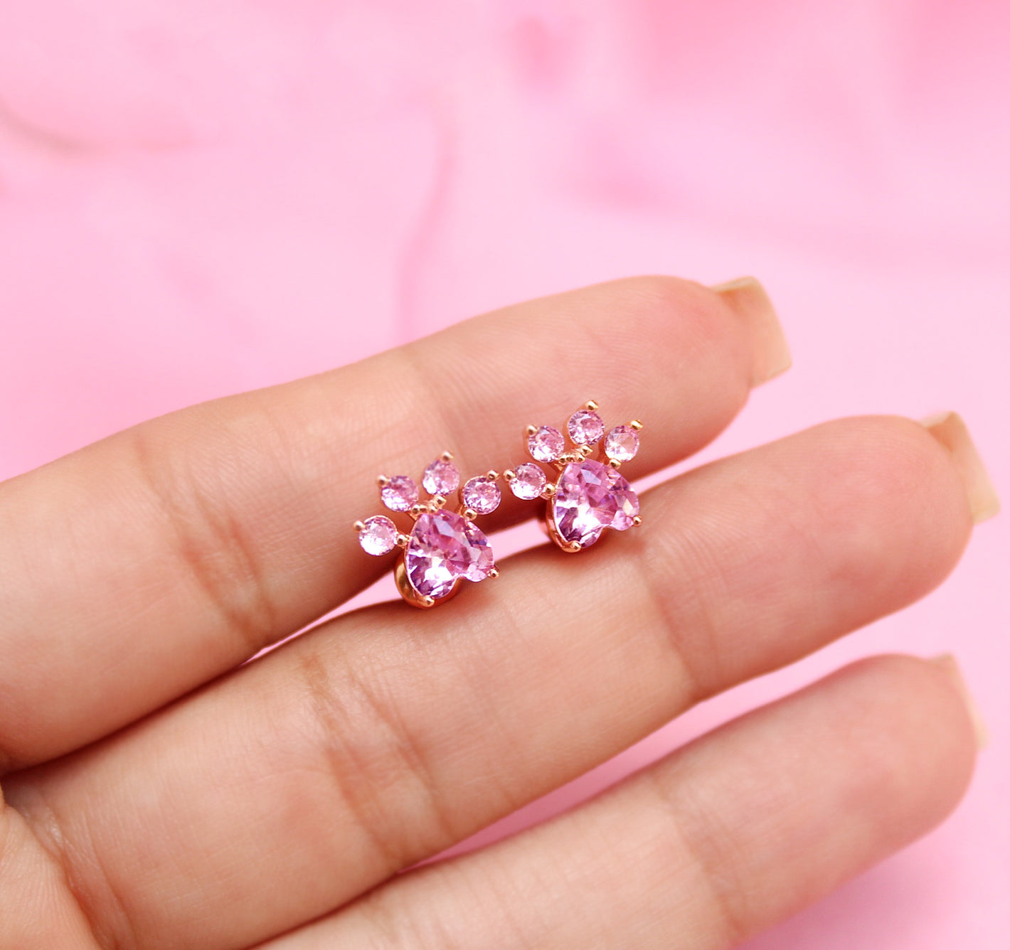 Aretes huellitas rosa